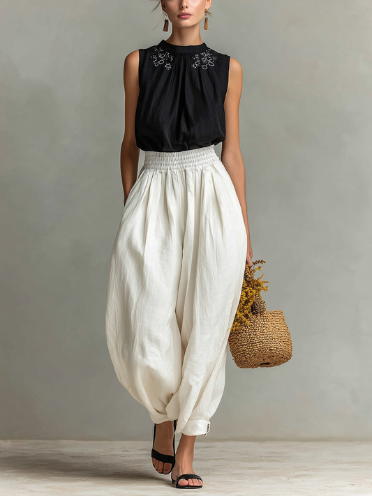 Women's Casual Black Cotton-Linen Sleeveless Crew-Neck Top With Embroidery, Paired With White Trousers