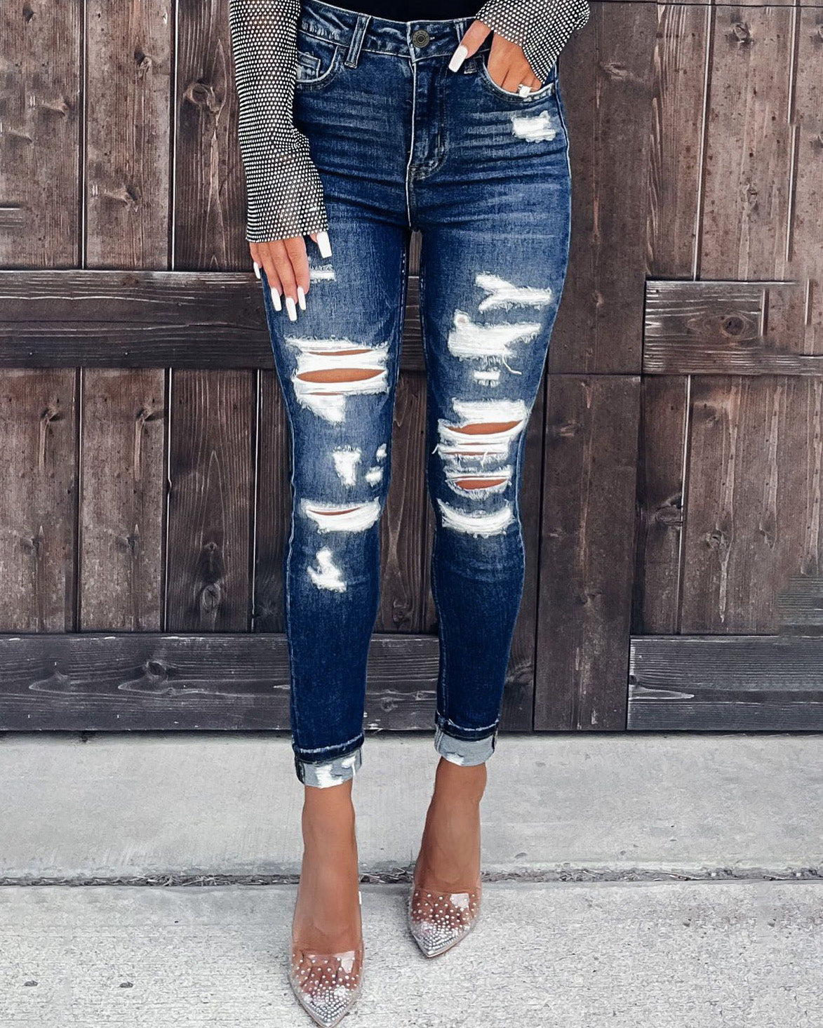 DISTRESSED SLIM JEANS