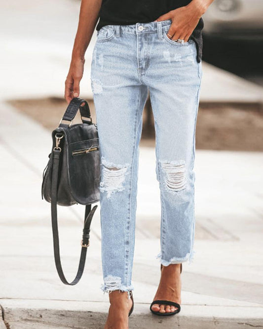 DISTRESSED DENIM JEANS